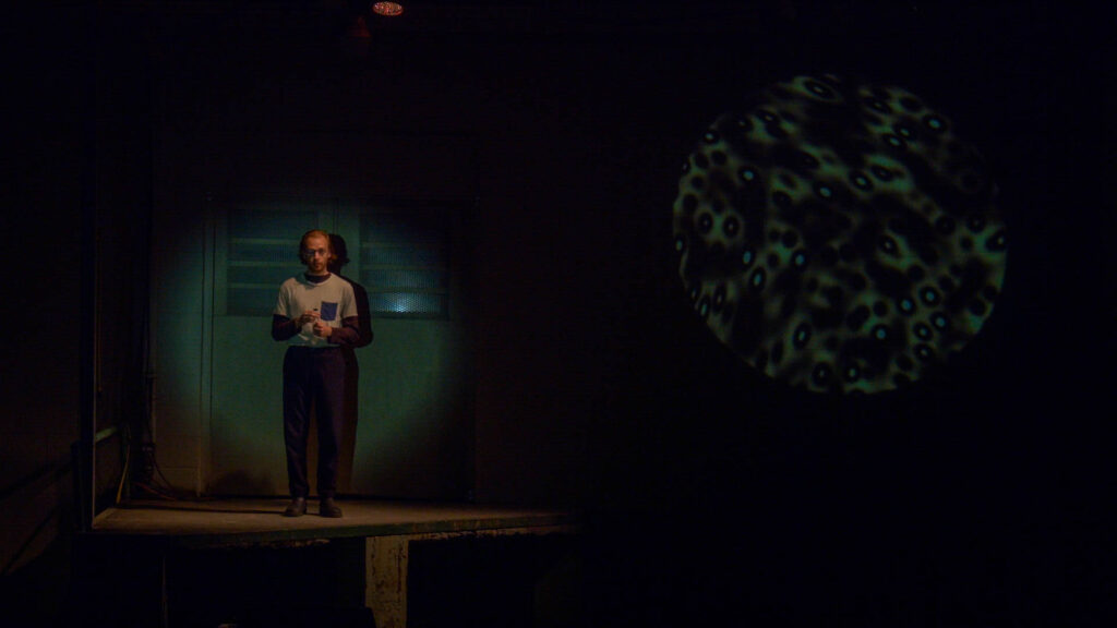 Chris Holtkamp as Scientist in Blue Marble